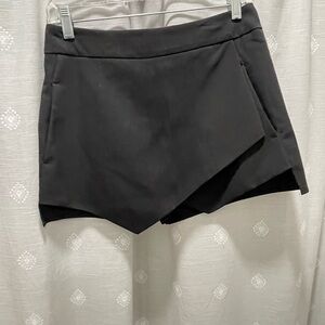Black asymmetrical envelope skirt